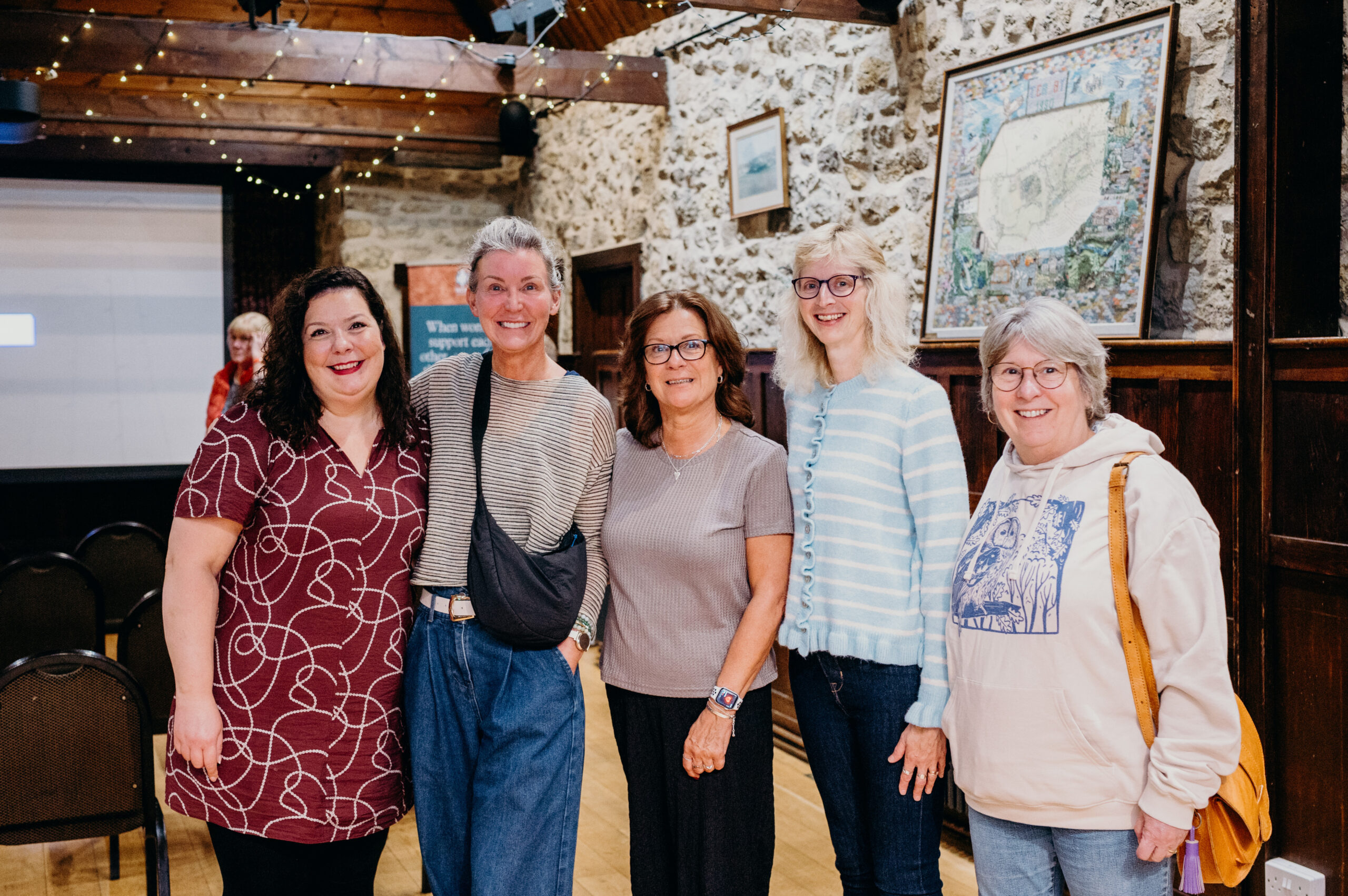 Group of Midlife Women smiling at WOW Worthy Women wellbeing event